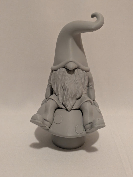 Gnome sitting on a mushroom